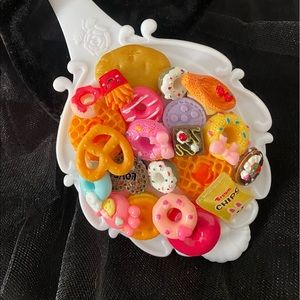 A decorated hand held mirror